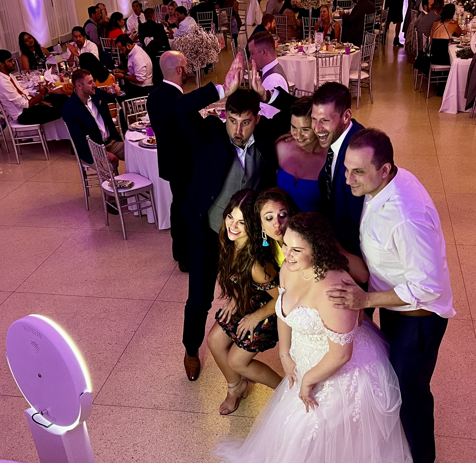 Wedding guests enjoying the First Coast Selfie photo booth