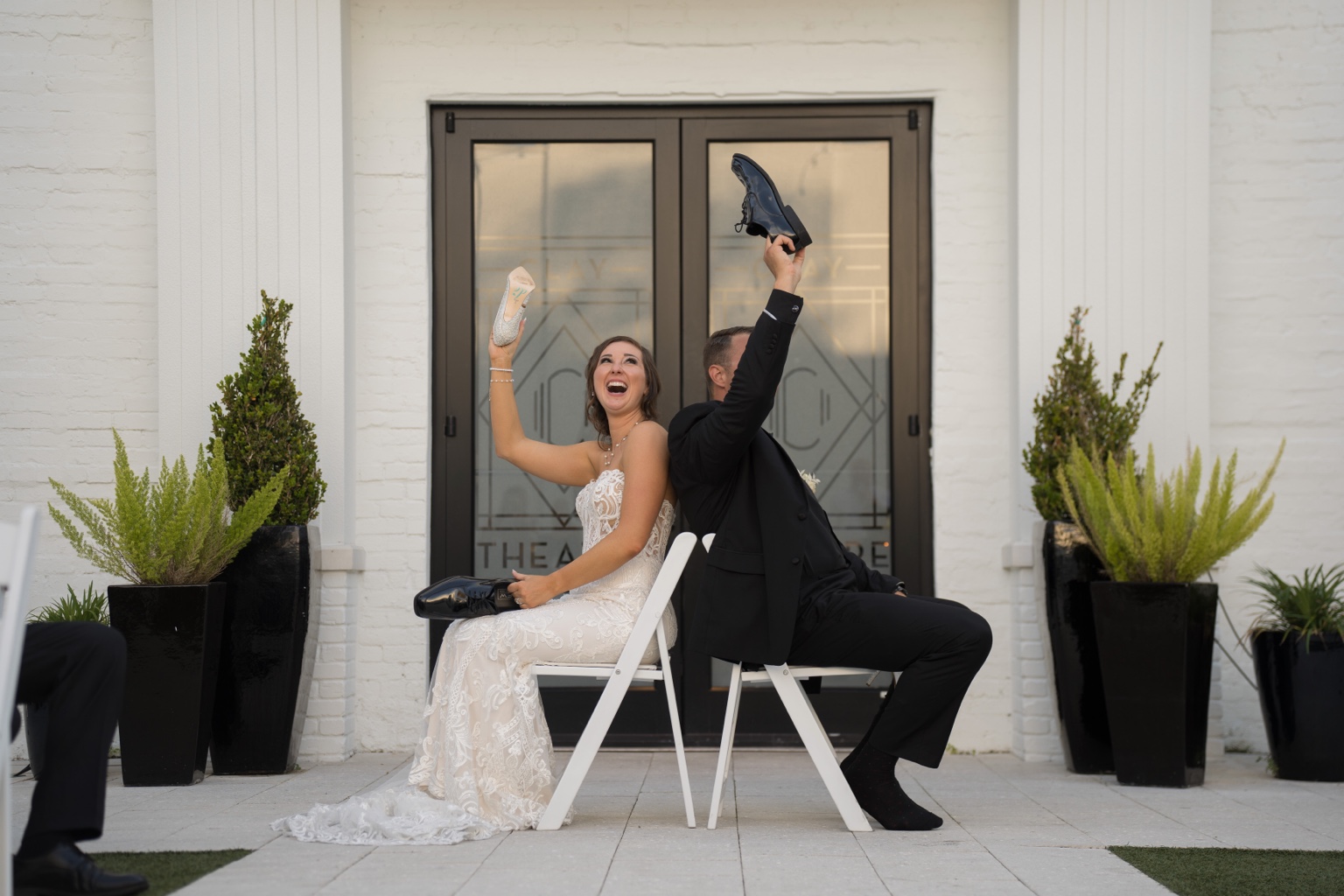 Bride and groom enjoying the wedding shoe game
